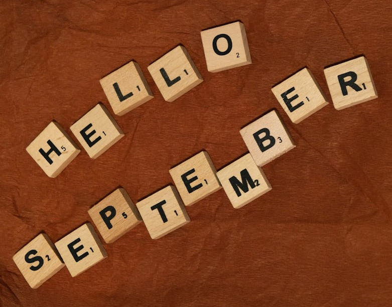 Wooden letters spell "Hello September"