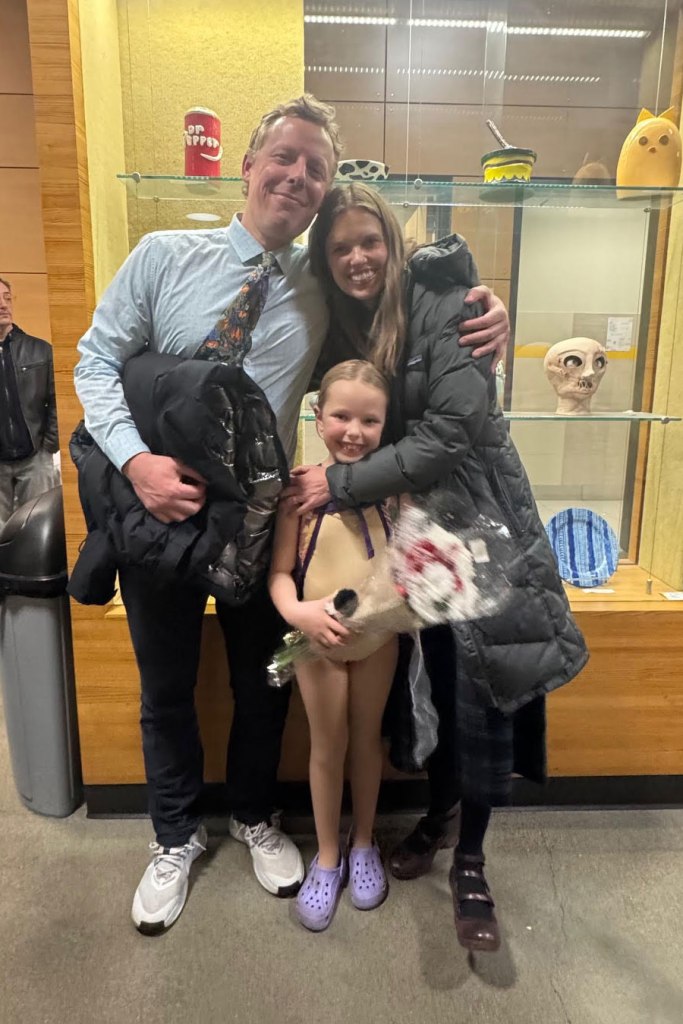 Eleanor poses after the performance with her family.